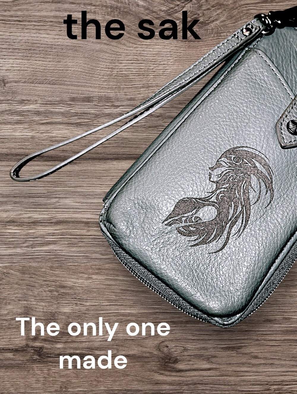 The Sak  Slate Gray Leather Wristlet Clutch with Engraved Art Work